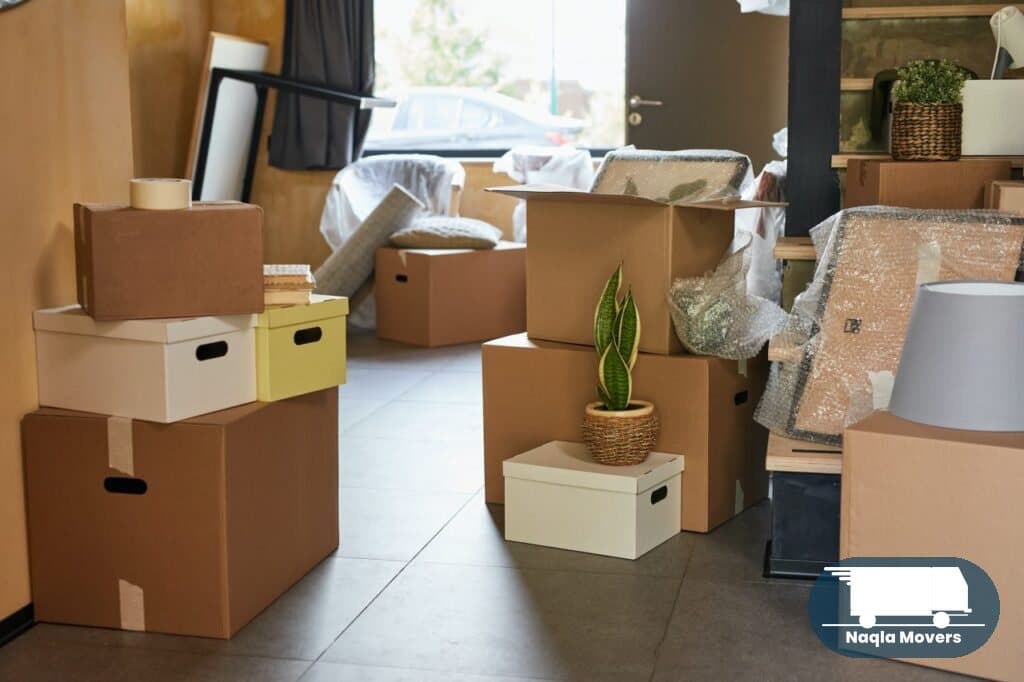 Neatly stacked moving boxes in a new home after a summer relocation in the UAE